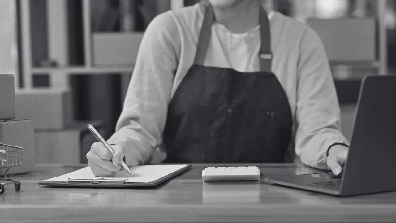small business owner managing orders with virtual professional support